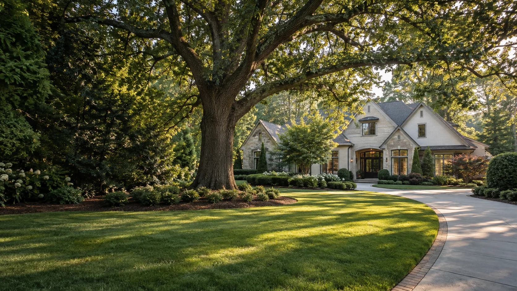 Mature oak and professionally maintained landscape at a Georgia home